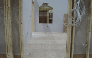 A room that is being remodeled with wood framing.